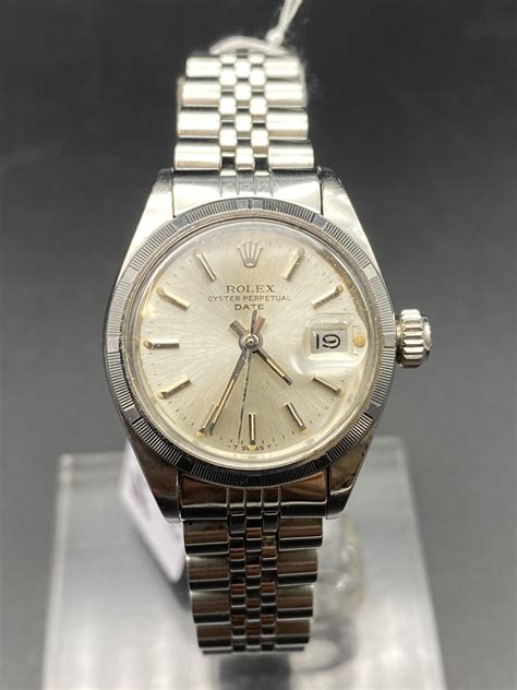 orecchino rolex